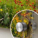 Close-up corner detail of an acrylic face mount with stainless steel stand-offs